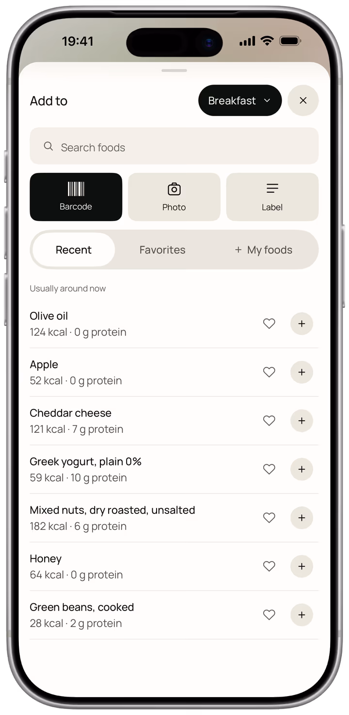 The add food sheet, with a search field, barcode, photo and label buttons, and recently logged foods listed first with their calories and protein