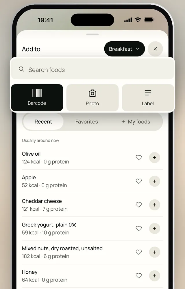 The add food sheet with barcode, photo and label buttons above recent foods with their calories and protein